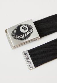 Black woven belt featuring a silver metal buckle with an "8 ball" design and "SANTA CRUZ" text, accented by a silver tip with logo.