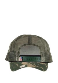 Green mesh trucker hat with camo-patterned visor and adjustable snapback. Features a small American flag accent. Textured finish throughout.