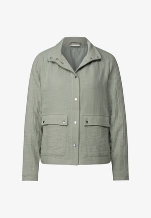 Chaqueta texturizada de color verde claro con cuello, botones a presión y dos bolsillos frontales. Hecha de una tela tejida para un ajuste relajado.