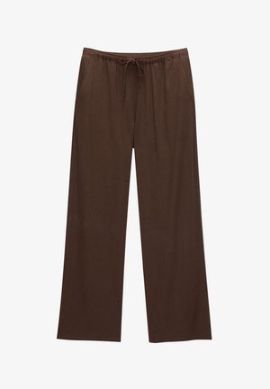 Braune weite Hosen aus weichem Stoff, mit einem elastischen Bund und Kordelzug sowie zwei Seitentaschen.