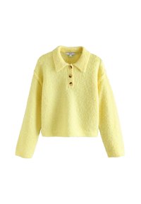 Żółty krótki sweter z miękkiej, teksturowanej tkaniny, z kołnierzykiem i trzema drewnianymi guzikami z przodu. Długie rękawy, luźny krój.