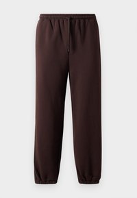 Braune Jogginghosen mit einem kordelzug-verstellbaren Bund, elastischen Bündchen und glattem Baumwollmaterial. Sie zeichnen sich durch eine lockere Passform und ein minimalistisches Design aus.