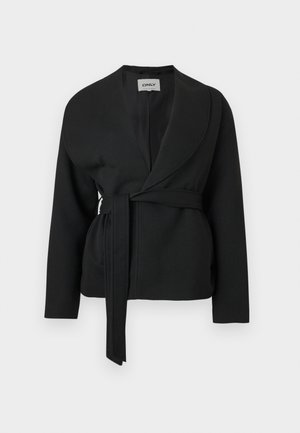 Black belted jacket with shawl collar and long sleeves, hanging against a white background.