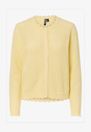 Lys gul strikket cardigan med lange ermer, rund bølget halskant, bølget kant nederst og knapper foran.