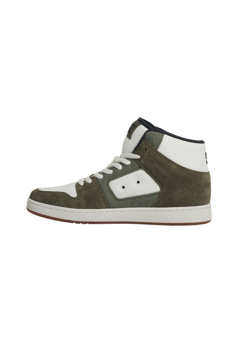 Mid-top sneakers in green suede and white leather, featuring a padded collar, round toe, and rubber sole with textured tread.
