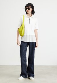 Marc Cain T Essentials White Round Necked T Shirt +E 48.69 J14 100 main image 1