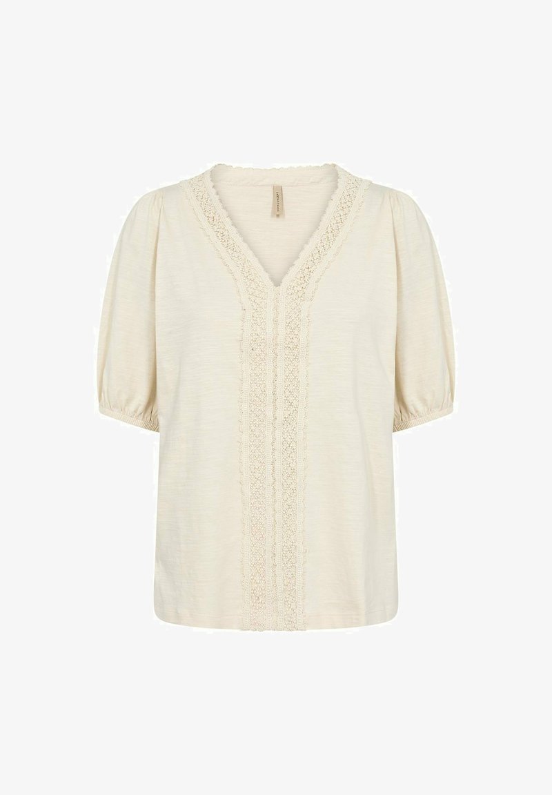 Cremfarbene Bluse mit V-Ausschnitt und Spitzenbesatz vorne. Besitzt kurze Puffärmel und einen weichen, strukturierten Stoff.