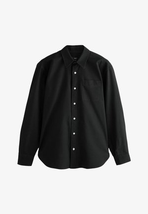 Camicia nera a maniche lunghe con colletto a punta, taschino sul petto, bottoni bianchi e orlo dritto. Realizzata in tessuto a trama.