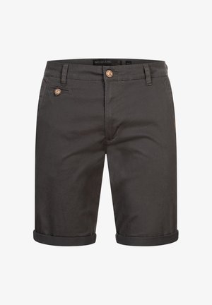 Pantaloni corti in cotone grigio scuro con una texture liscia, orli arrotolati e chiusura con bottone frontale. Presenta un sottile dettaglio del logo sul lato.