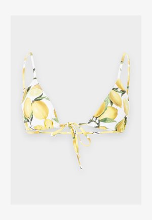 Haut de bikini blanc avec imprimé citron jaune et feuille verte, avec fines bretelles et fermeture à nouer devant.