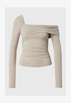 Beige long-sleeve top with an off-the-shoulder design, featuring a ruched texture and a fitted silhouette. Smooth, stretchy fabric.