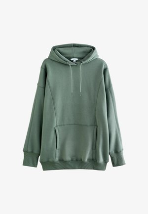 Hoodie oversize vert olive avec poche kangourou avant, capuche à cordon, poignets côtelés et épaules tombantes sur fond blanc.