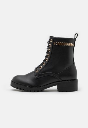 Stivaletti stringati - black