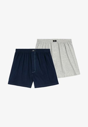 Navy blue boxer shorts made of cotton blend, featuring an elastic waistband with logo and a front opening detail. Smooth texture.
