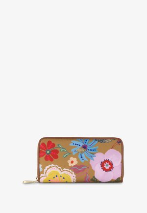 Bloemige portemonnee met een tan achtergrond, voorzien van levendige kleuren, ingewikkelde bloemenpatronen, gouden ritsbeslag en een logoaccent.