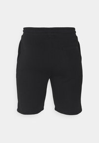 Sorte shorts lavet af blødt stof med elastisk talje, sidelommer og en baglomme. Enkel design uden mønstre.
