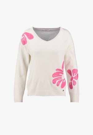 Suéter blanco con cuello en V, mangas largas, con grandes estampados florales rosas en el lado izquierdo y un pequeño logo en el dobladillo. Textura suave.