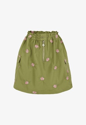 Groene katoenen rok met een elastische tailleband, een rits aan de voorkant, zijzakken en roze bloemenborduursel overal.