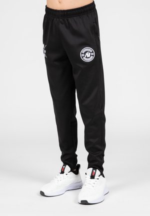 VERNON - Tracksuit bottoms - black