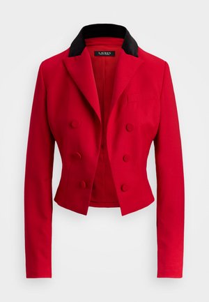 Sarkans īss žakets ar melnu norvēģu apkakli, dubultās pogas dizains, apaļas pogas un viena krūšu kabata. Gluda auduma tekstūra.