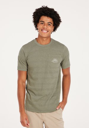 Olijfgroene T-shirt met korte mouwen, voorzien van een zak, van een gestructureerde stof, en een wit zonlogo. Ronde halslijn en een ontspannen pasvorm.