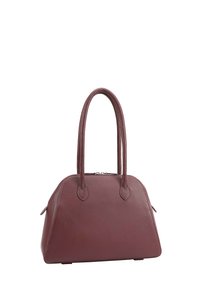 Donkerbruine leren handtas met dubbele lange handvatten en een bovenste ritssluiting, die rechtop staat op een witte achtergrond.