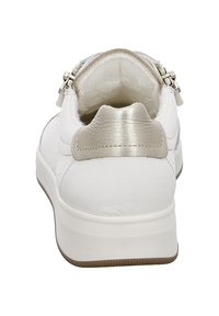 White leather sneaker with soft lining, a smooth silver accent at the heel, and a textured design on the upper. Flat rubber sole.