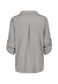 Gray, long-sleeve shirt with vertical white stripes, featuring a collar and rolled cuffs. Smooth fabric with a relaxed fit and back pleat detail.
