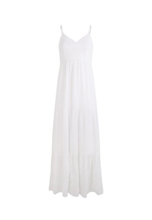 Robe maxi blanche à fines bretelles, avec des broderies sur le corsage et une jupe à volants. Tissu léger, forme fluide.