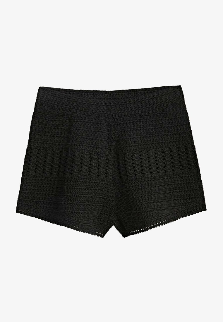 Shorts en crochet noir avec des bandes texturées et des bords festonnés. Dotés d'une taille haute et d'une silhouette ajustée.