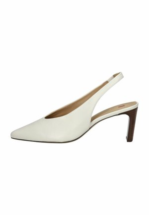 Slingback con punta bianca in pelle, con design a ritaglio e tacco in legno impilato. Fodera interna beige morbida.