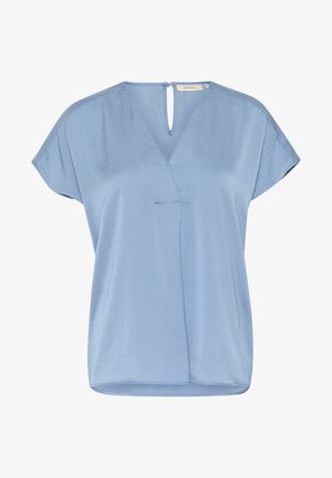 Blouse bleu clair avec un décolleté en V profond, des manches courtes à empiècement, et une finition légèrement texturée. Présente une ouverture en forme de trou de serrure à l'arrière.