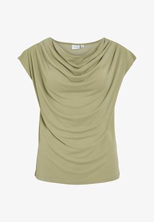 Haut court à manches courtes vert clair avec un décolleté drapé. Tissu doux et lisse avec une texture subtile. Aucun motif ni accessoire visible.