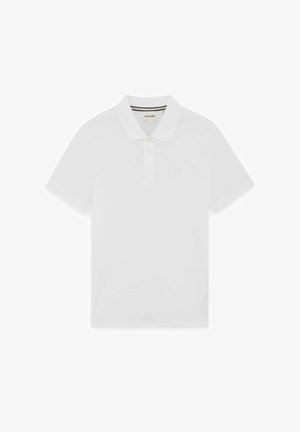 Polo blanc à manches courtes avec col, trois boutons et logo brodé discret sur le côté gauche de la poitrine.