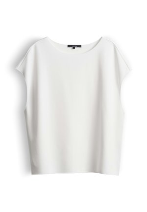 Witte mouwloze blouse met een ronde hals en een losse pasvorm, afgebeeld tegen een witte achtergrond.