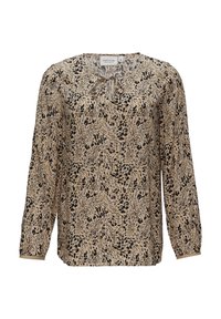 Langarmblouse van beige stof met een vloeiende snit, zwart abstract patroon en een klein strikdetail bij de hals.