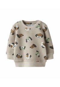 Felpa beige in tessuto a nido d'ape con motivi colorati di cani in varie posizioni. Polsini e orlo a coste con scollo rotondo.