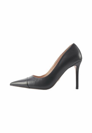 Black leather high-heeled pump with pointed toe and stitched accent at the front. Smooth texture and slender 4-inch heel design.