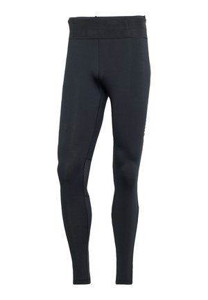 Leggings noirs fabriqués dans un matériau extensible avec une taille haute, présentant un panneau en maille texturée sur les côtés et une coupe ajustée.