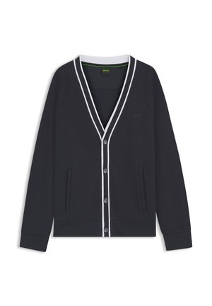 Granatowy kardigan z miękkiej bawełny z białymi akcentami, dekolt w serek, zapięcie na guziki, dwie przednie kieszenie oraz ściągacze przy mankietach i na dole.