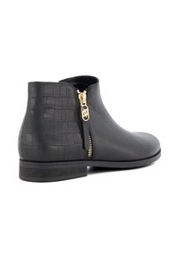 Black leather ankle boot with a textured croc-embossed panel, side zipper closure, and low stacked heel. Gold-tone hardware accents.