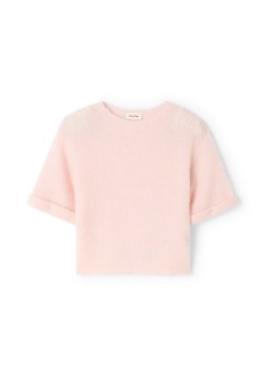 Pull-over à manches courtes et col rond en rose doux, fabriqué en tissu tricoté pelucheux. Présente des poignets roulés et une coupe décontractée.