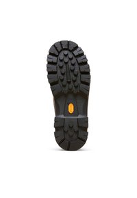 Sort gummistøvlesål med dybe mønstre og cirkulære greb. Har en fremtrædende orange Vibram-logo i midten for skridsikring.