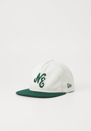 White cap with a green flat brim, featuring embroidered "NE" logo in green on the front. Manufacturer logo on the side in green.