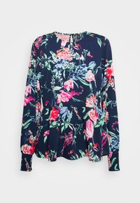 Blusa de manga longa em azul marinho com um vibrante padrão floral em rosa, vermelho e verde. Apresenta uma cintura franzida e punhos elásticos. Tecido leve.