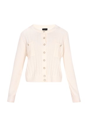 Balta megzta kardiganas su ilgomis rankovėmis, apvaliu iškirpimu, priekyje užsegamas mygtukais ir turintis dvi kišenes krūtinėje. Yra vertikalių ir horizontalių raštų.