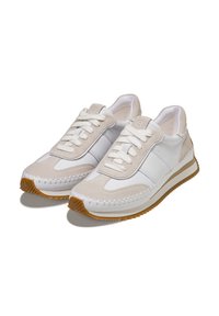 Vita och beige sneakers med material av mocka och läder, med en sömdesign, snörning och gummisula med ribbad textur.