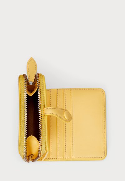 Yellow leather wallet with zip closure, several card slots, and a smooth texture. Features contrast stitching and a snap-button closure.