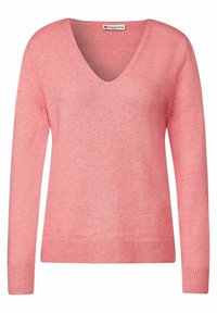 V-ringad pullover i mjukt rosa stickat tyg. Har långa ärmar och ribbad nederkant. Mjuk textur med minimal detaljering.