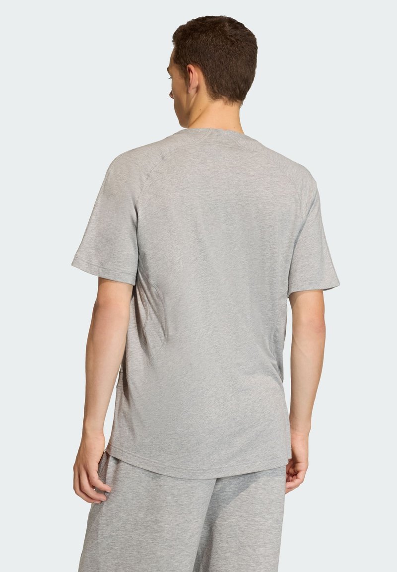 Grey short-sleeve T-shirt made of soft fabric, featuring a rounded neckline and a relaxed fit, with a plain design and no visible patterns.